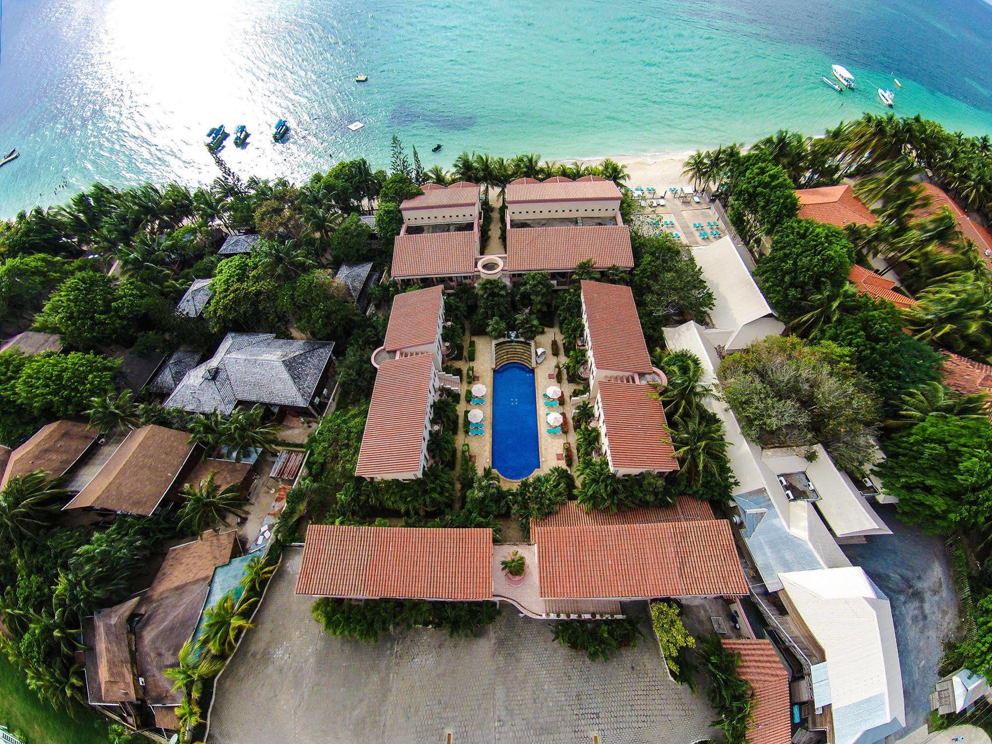 Las Sirenas Hotel And Condos West Bay Exterior photo
